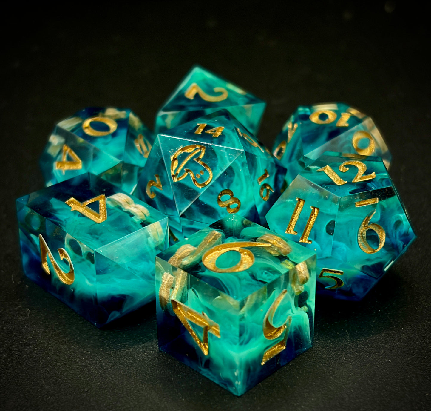 Cursed Treasure (7 piece polyhedral hand made dice set)